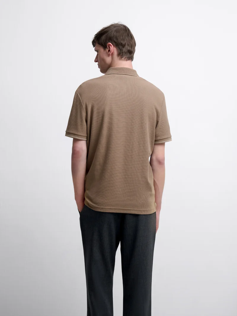 Polo col boutonné gauffré