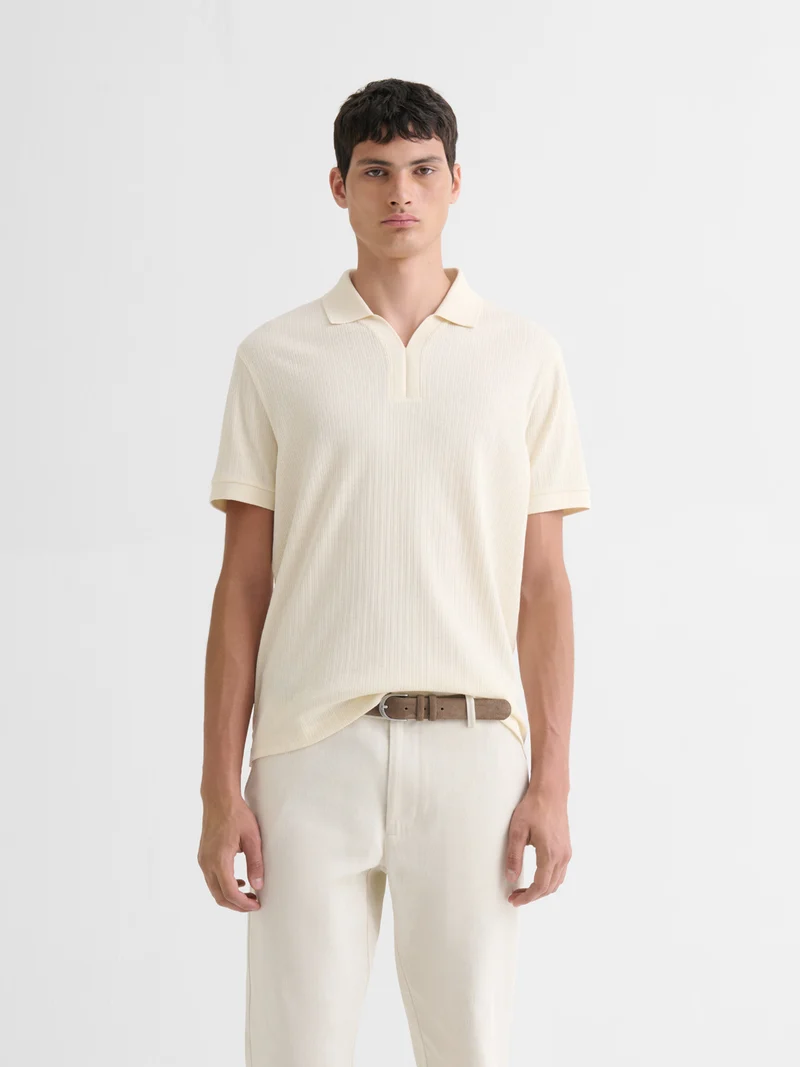 Polo col V effet maille