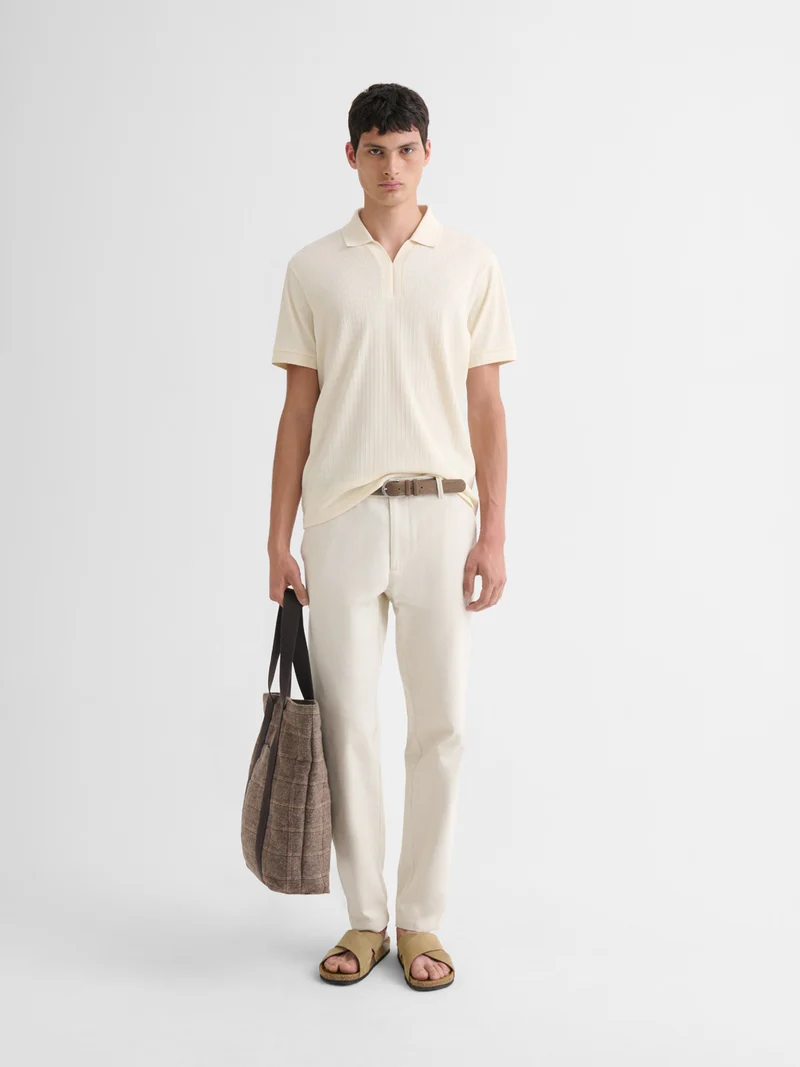 Polo col V effet maille