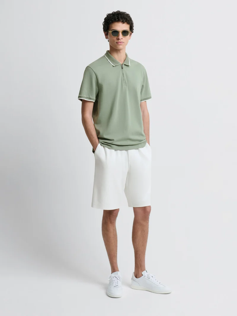 Polo zippé stretch
