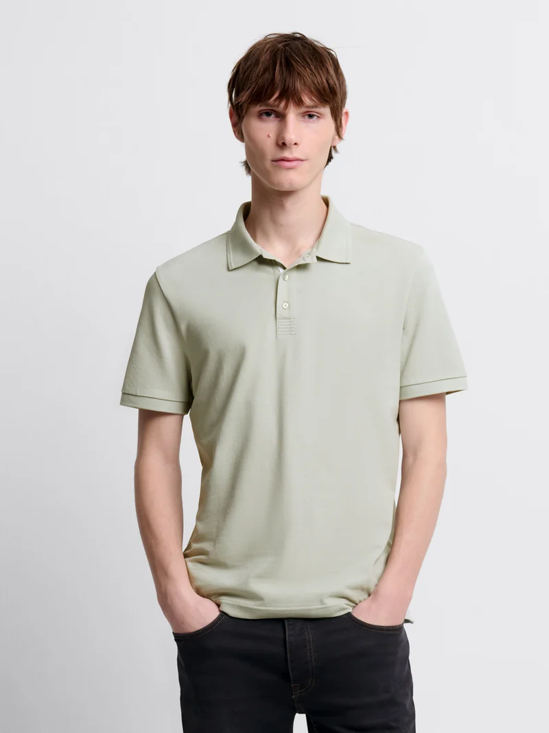 Polo col boutonné en coton