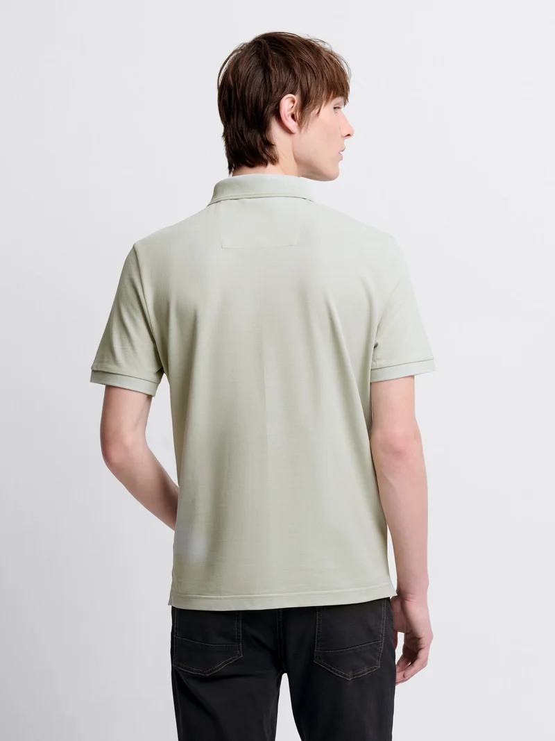 Polo col boutonné en coton