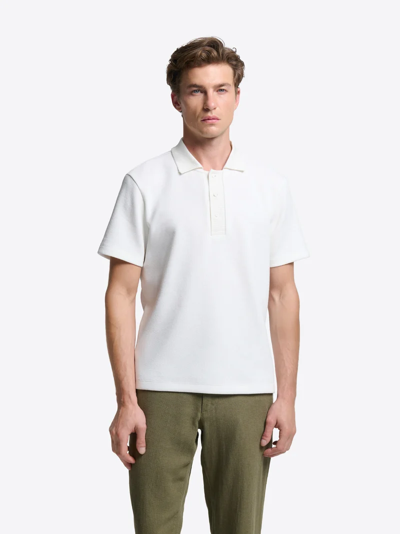 Polo regular col boutonné en coton