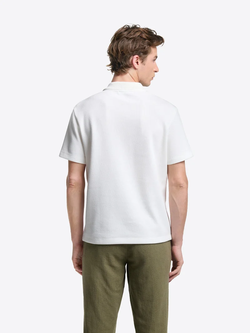 Polo regular col boutonné en coton