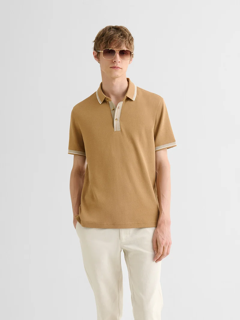 Polo boutonné en coton