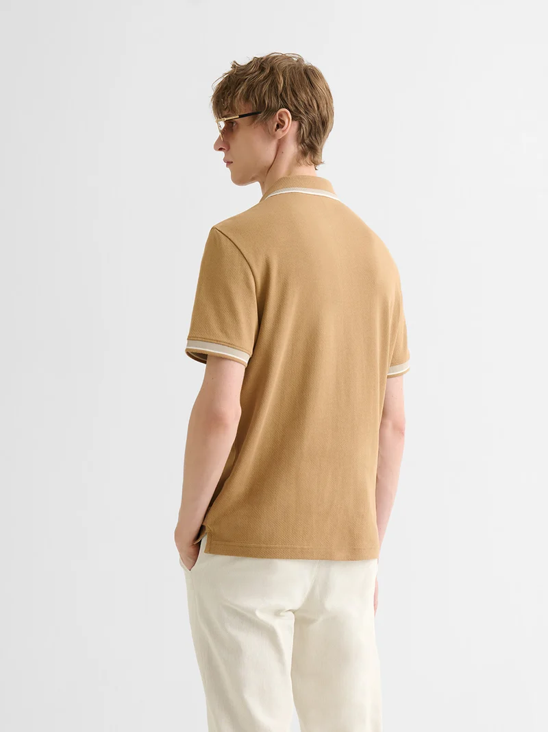 Polo boutonné en coton