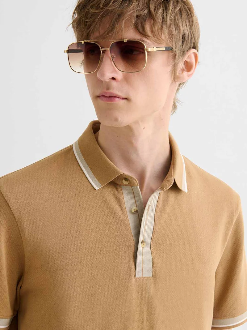 Polo boutonné en coton
