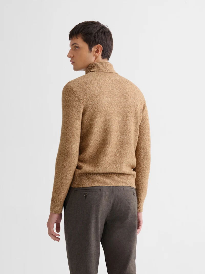 Pull col roulé jersey chiné