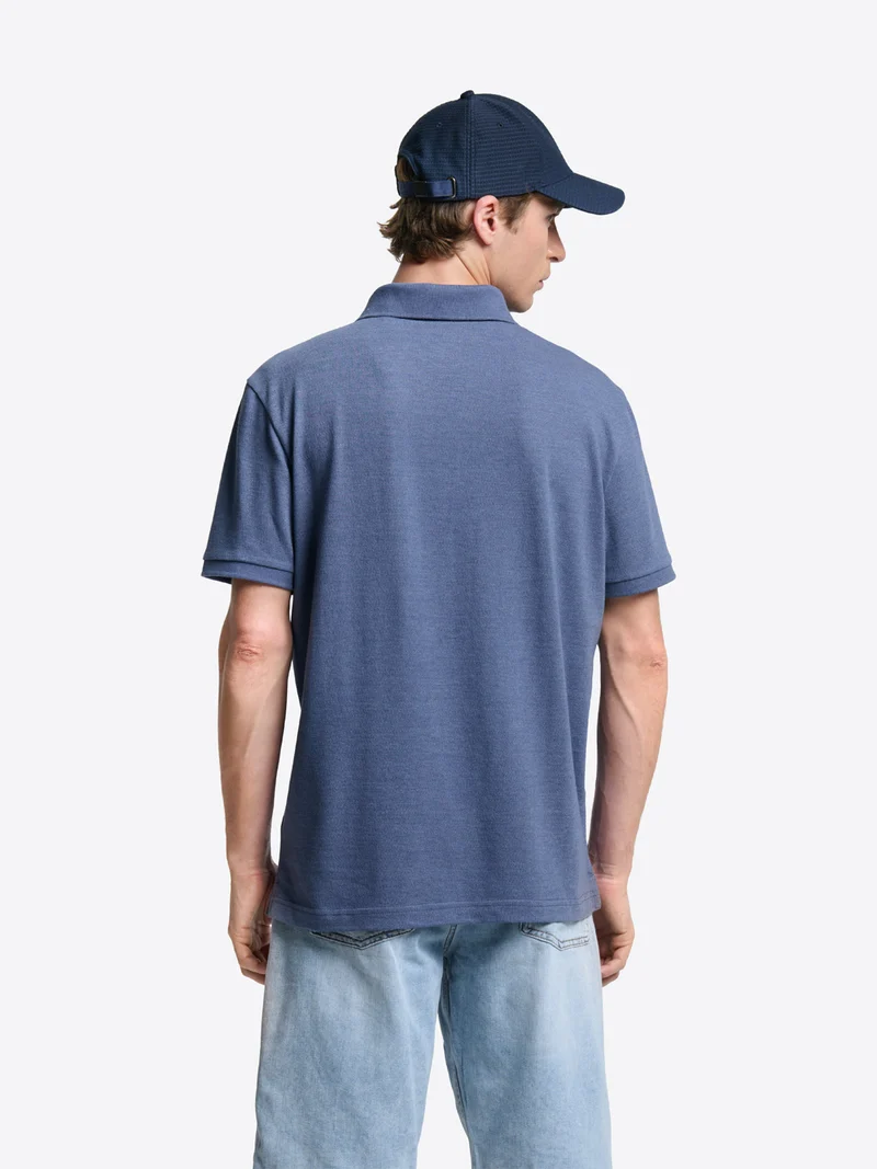 Polo col boutonné en coton chiné