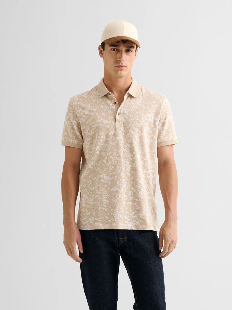 Polo boutonné en jacquard