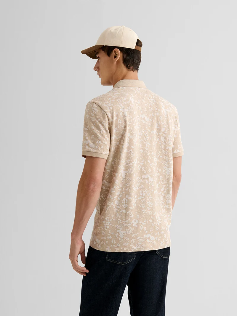 Polo boutonné en jacquard