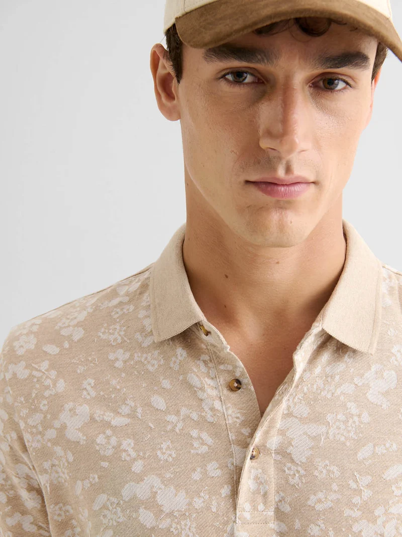 Polo boutonné en jacquard