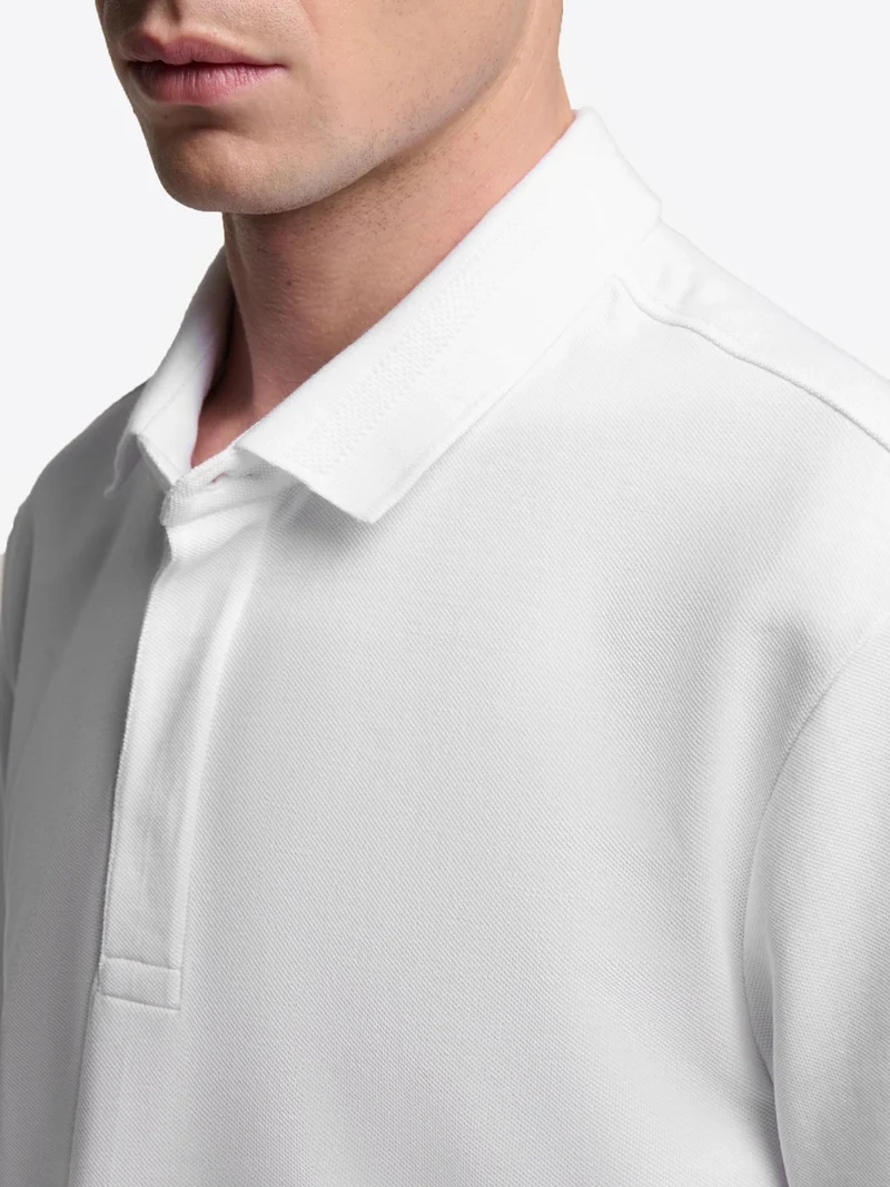 Polo boutonné en coton premium