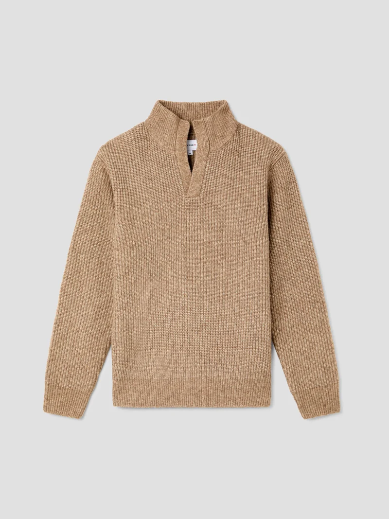 Pull col montant ouvert en maille perlée