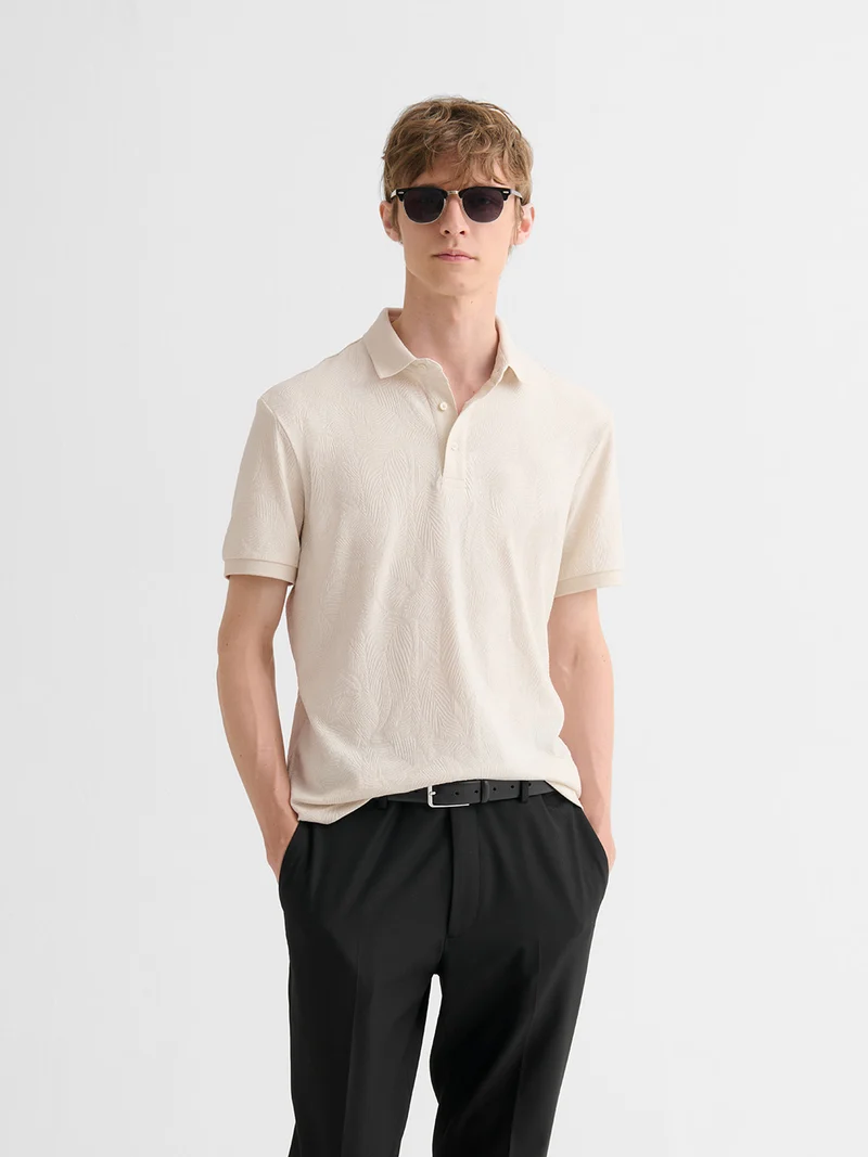 Polo boutonné en jacquard