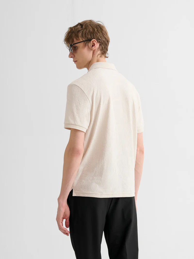 Polo boutonné en jacquard