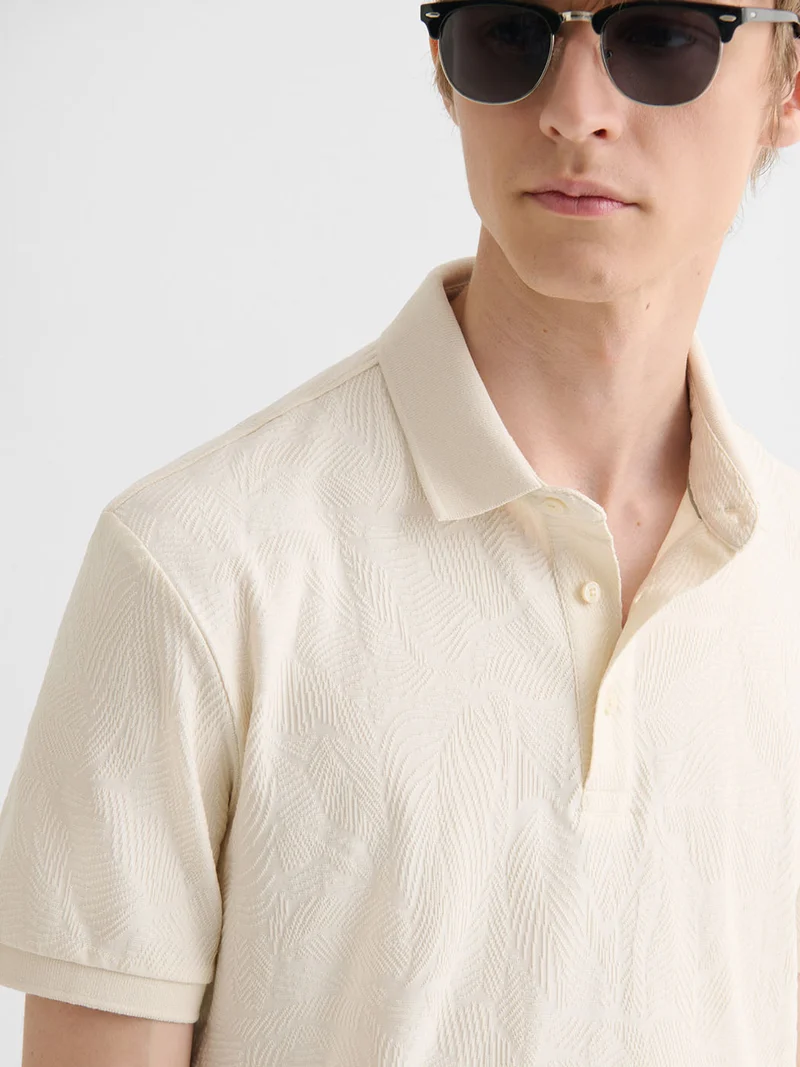 Polo boutonné en jacquard