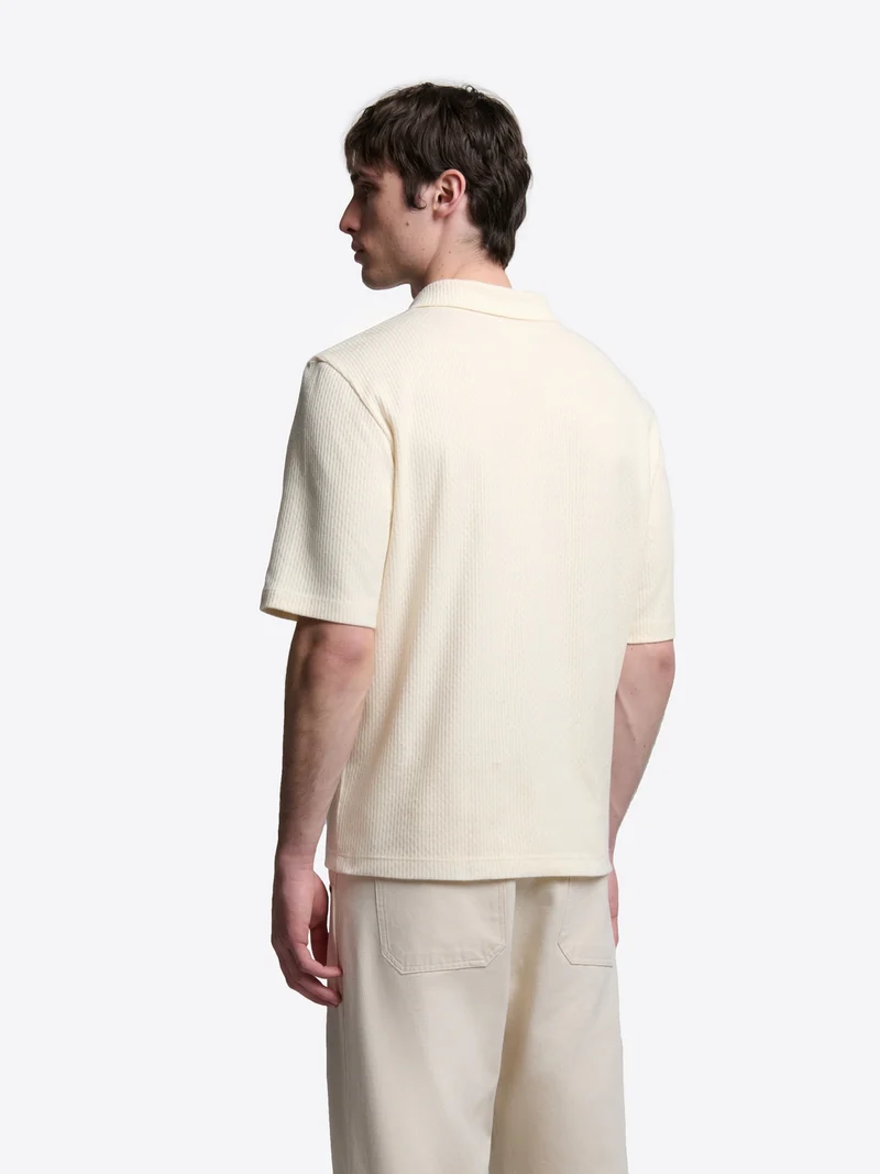 Polo col V en coton - L'atelier