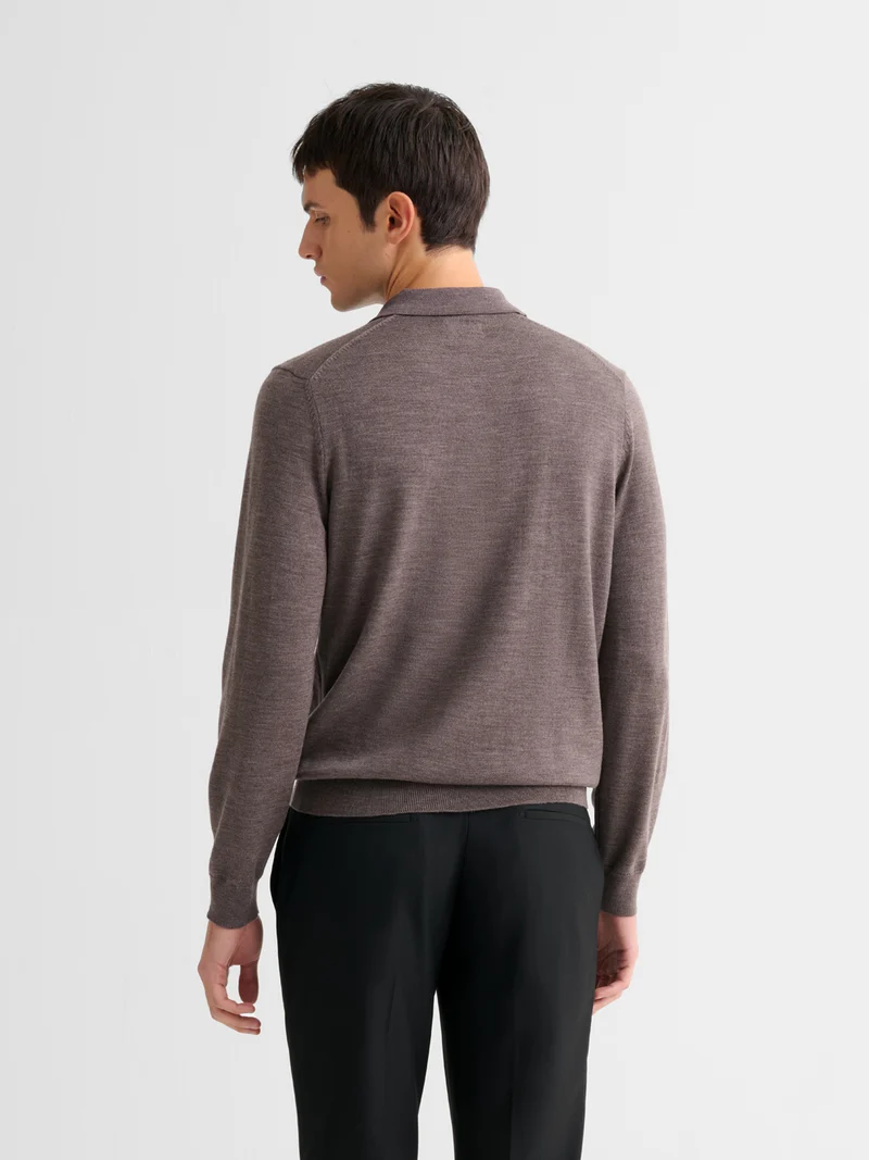 Polo boutonné en laine Mérinos