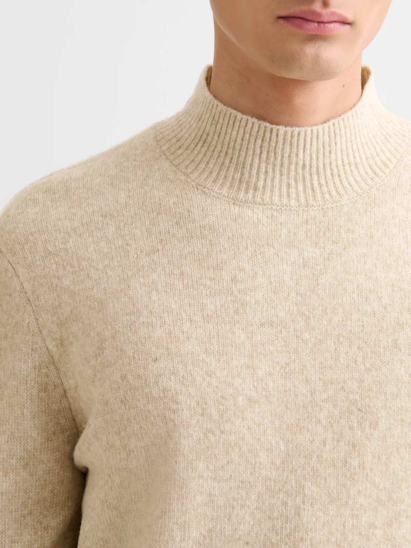 Pull col cheminée