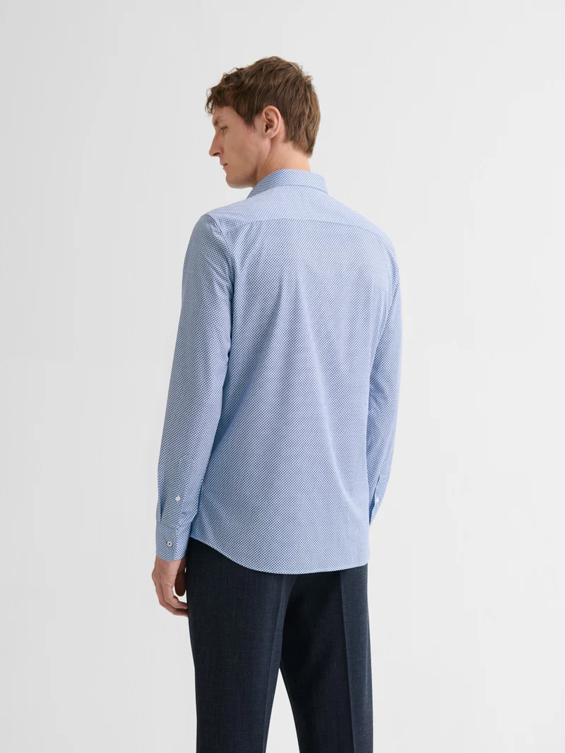 Chemise extraslim tissu traveler à motif