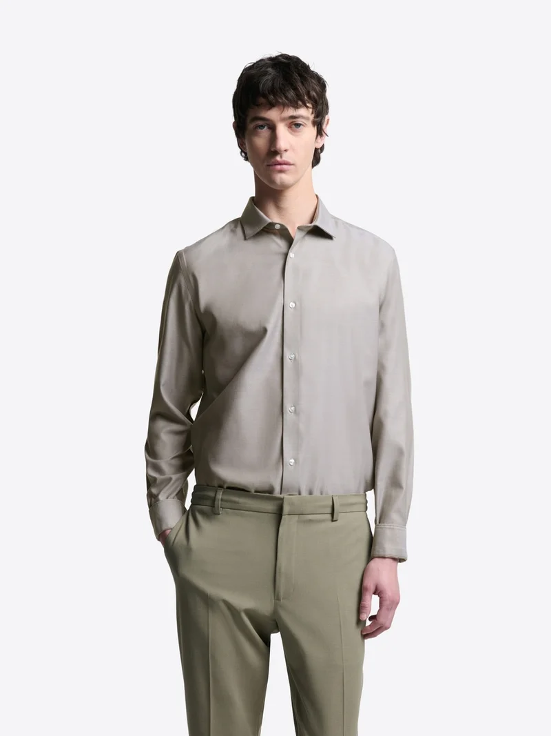 Chemise slim double retors unie