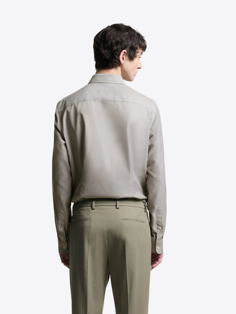 Chemise slim double retors unie