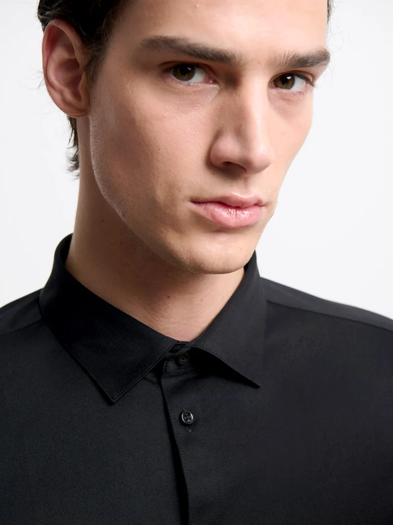 Chemise extraslim tissu traveler