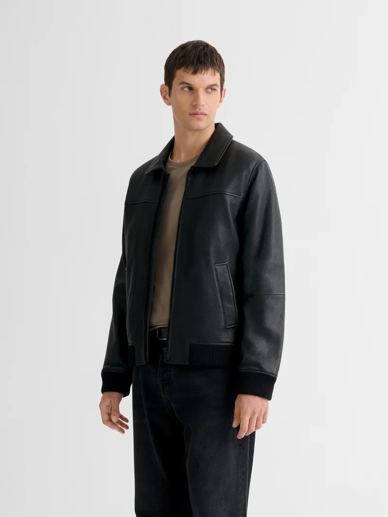 Blouson en cuir col sherpa