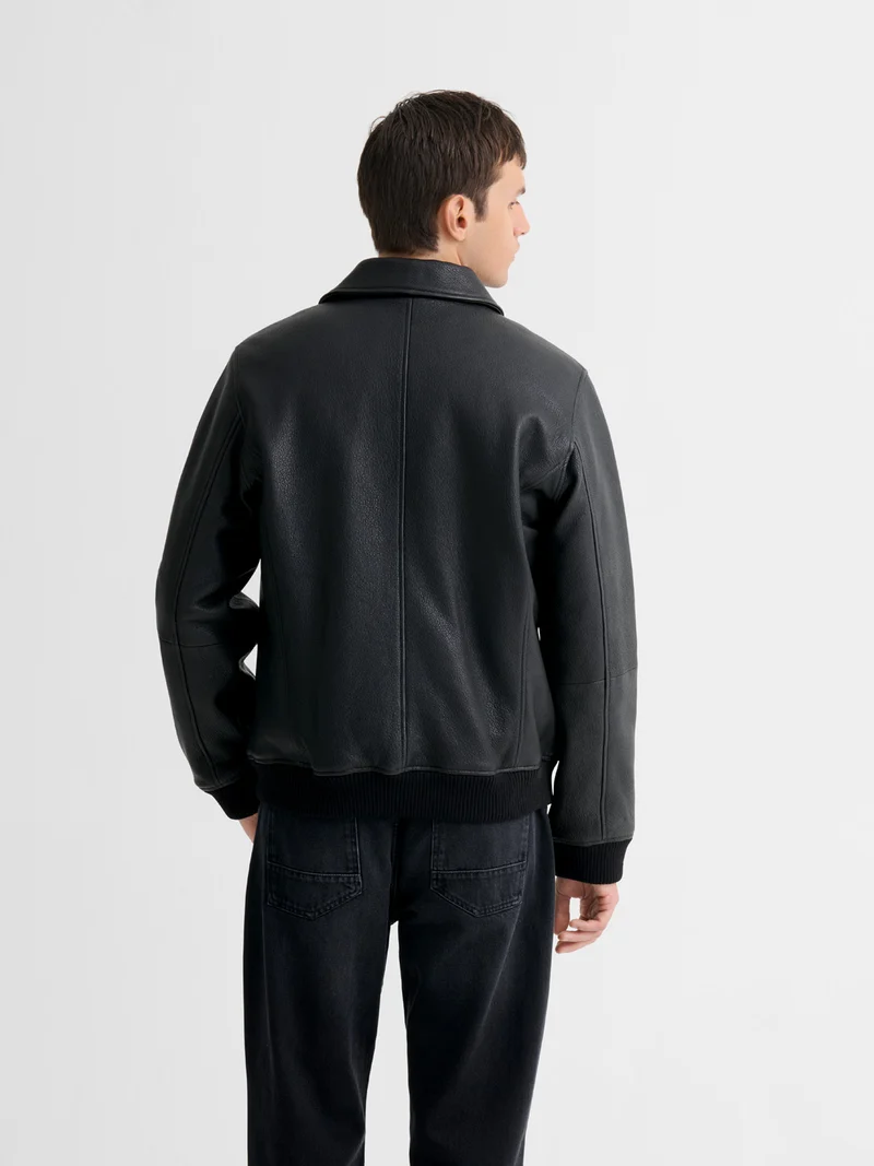 Blouson en cuir col sherpa