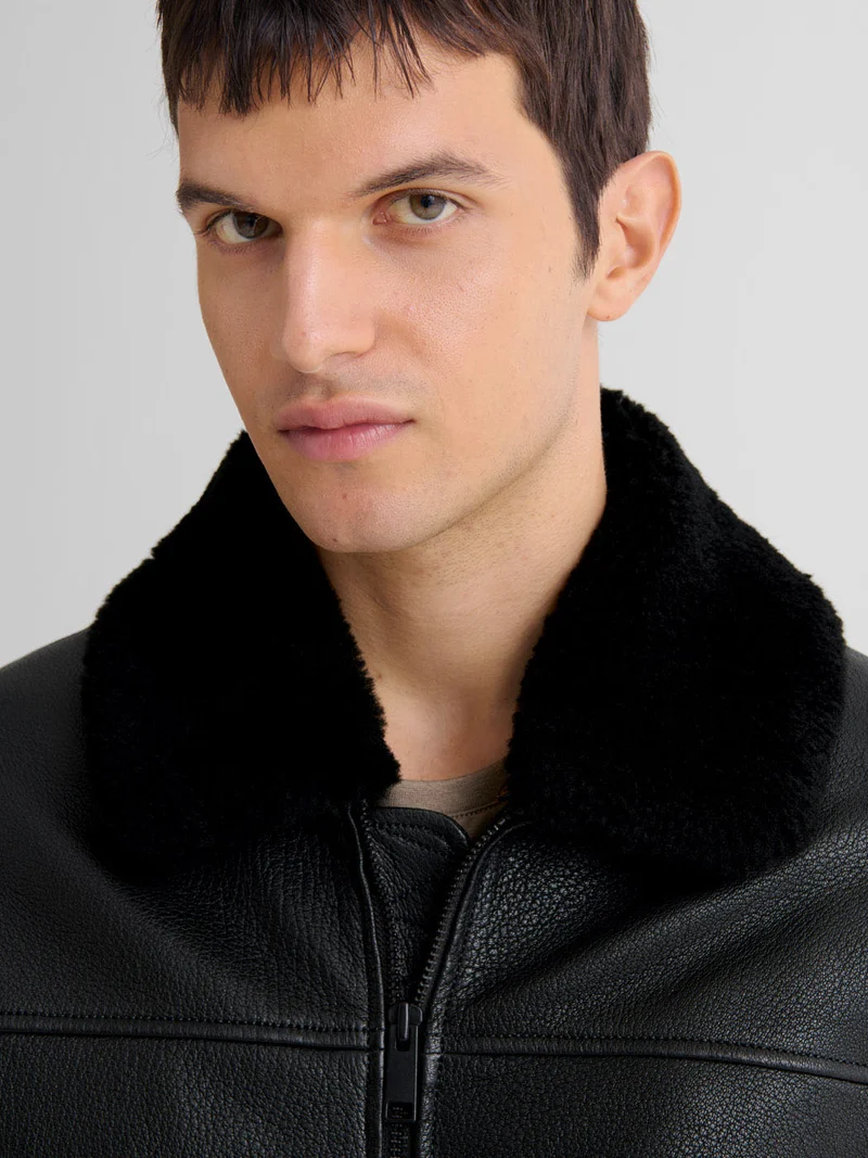 Blouson en cuir col sherpa