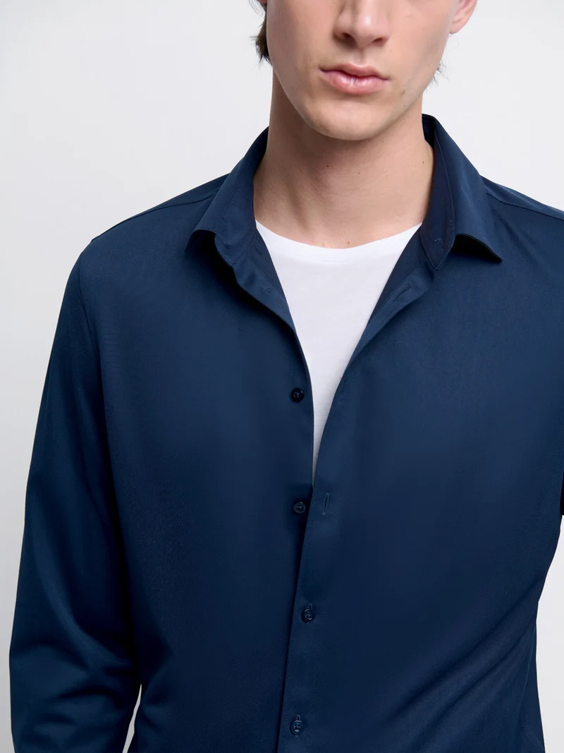 Chemise extraslim tissu traveler