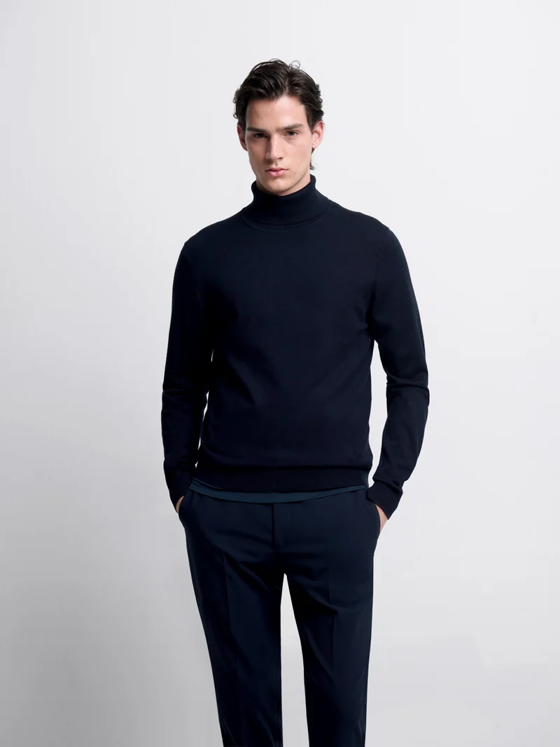 Pull col roulé en jersey