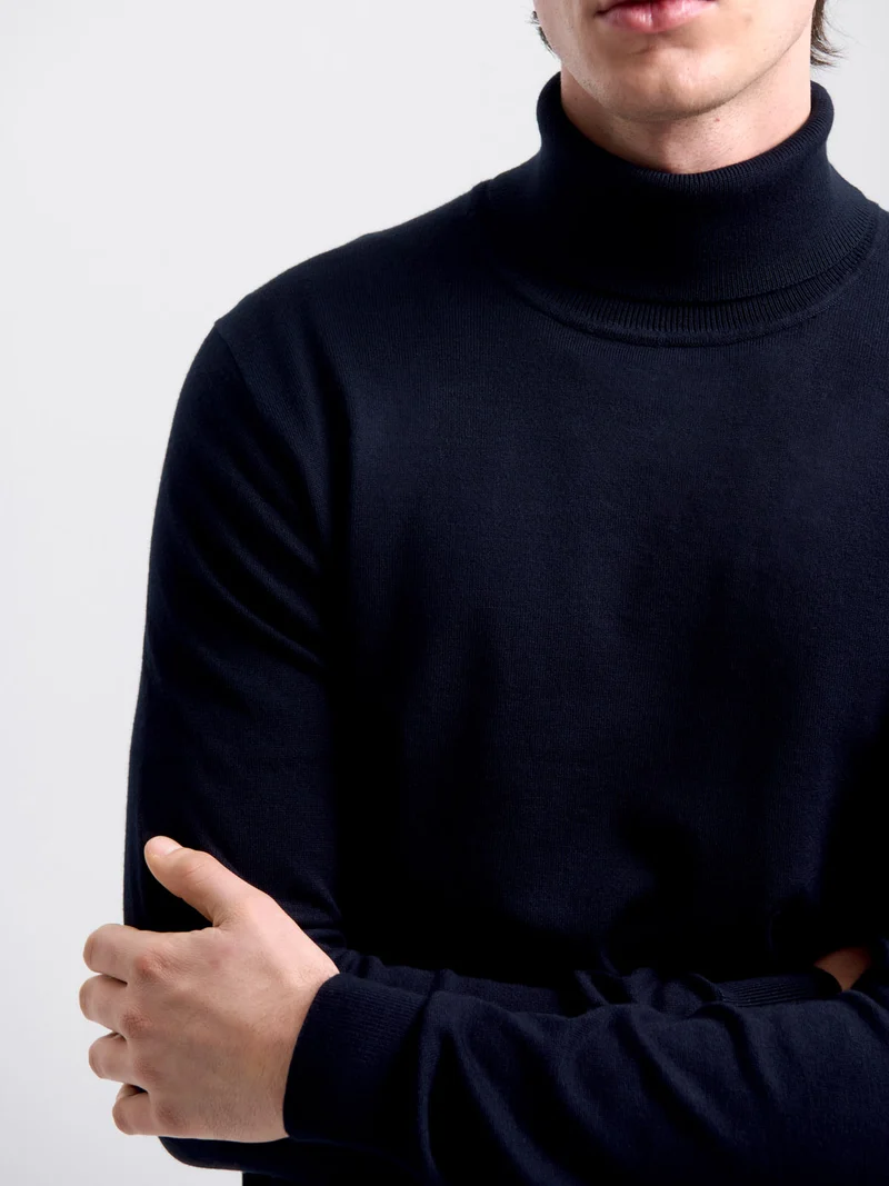 Pull col roulé en jersey