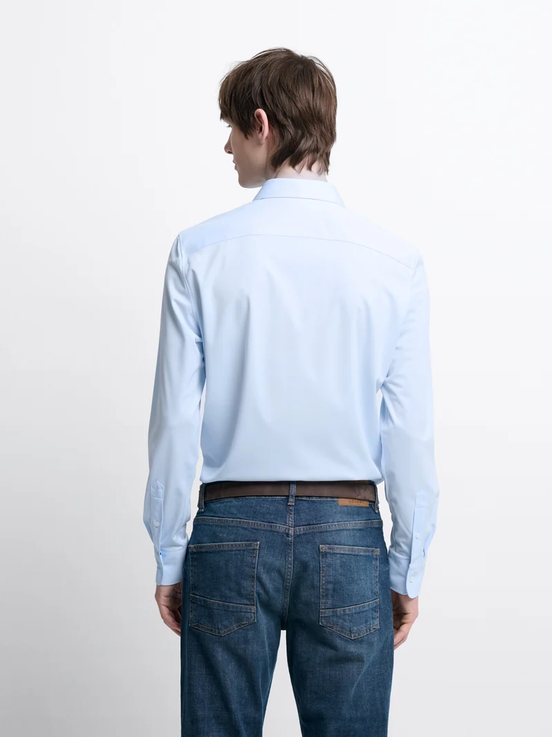 Chemise extraslim tissu traveler