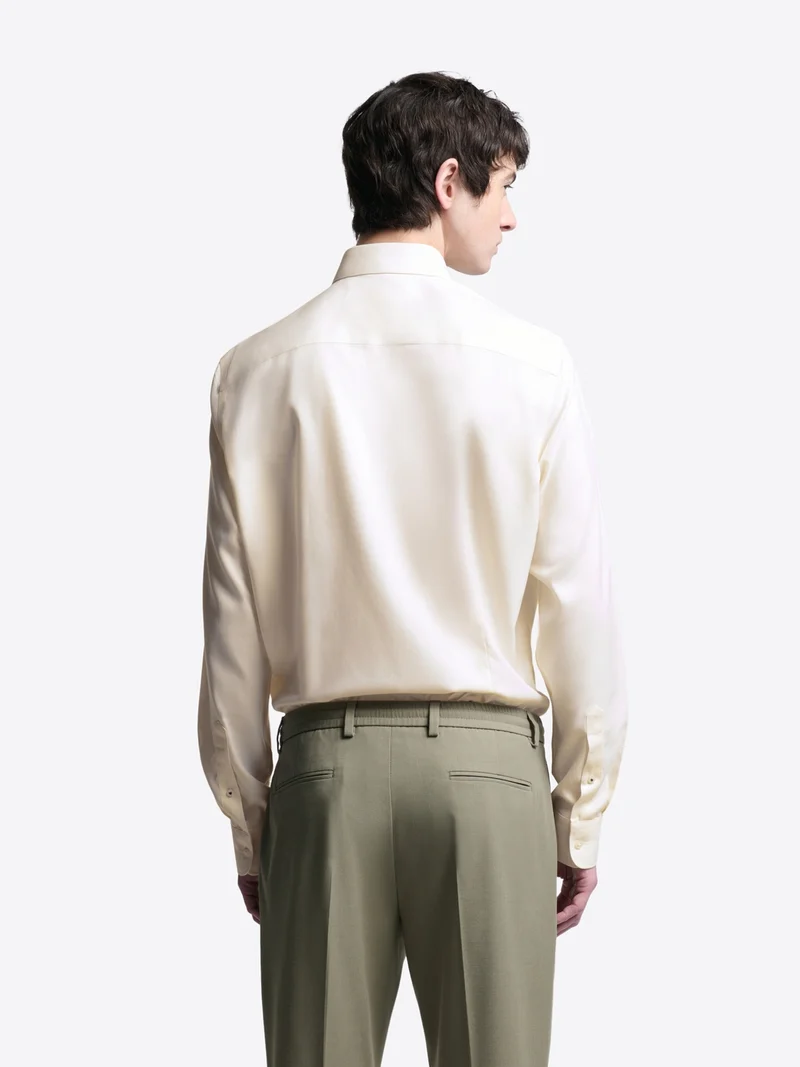 Chemise slim double retors unie