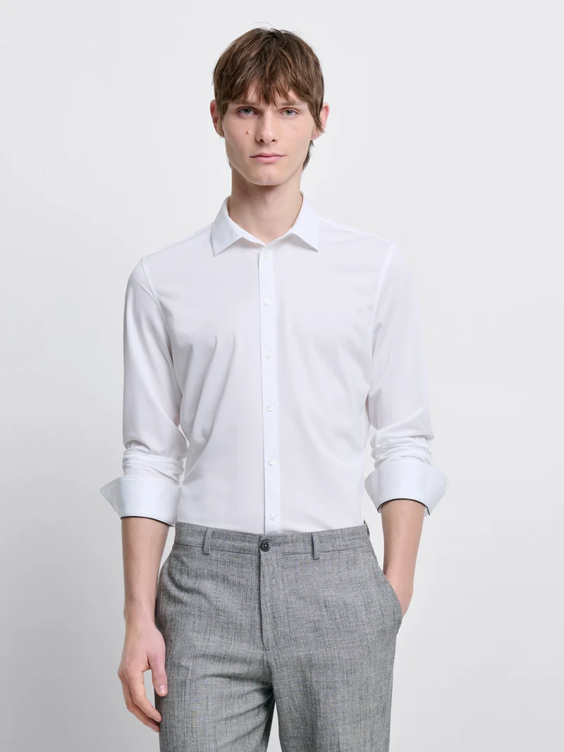 Chemise extraslim tissu traveler