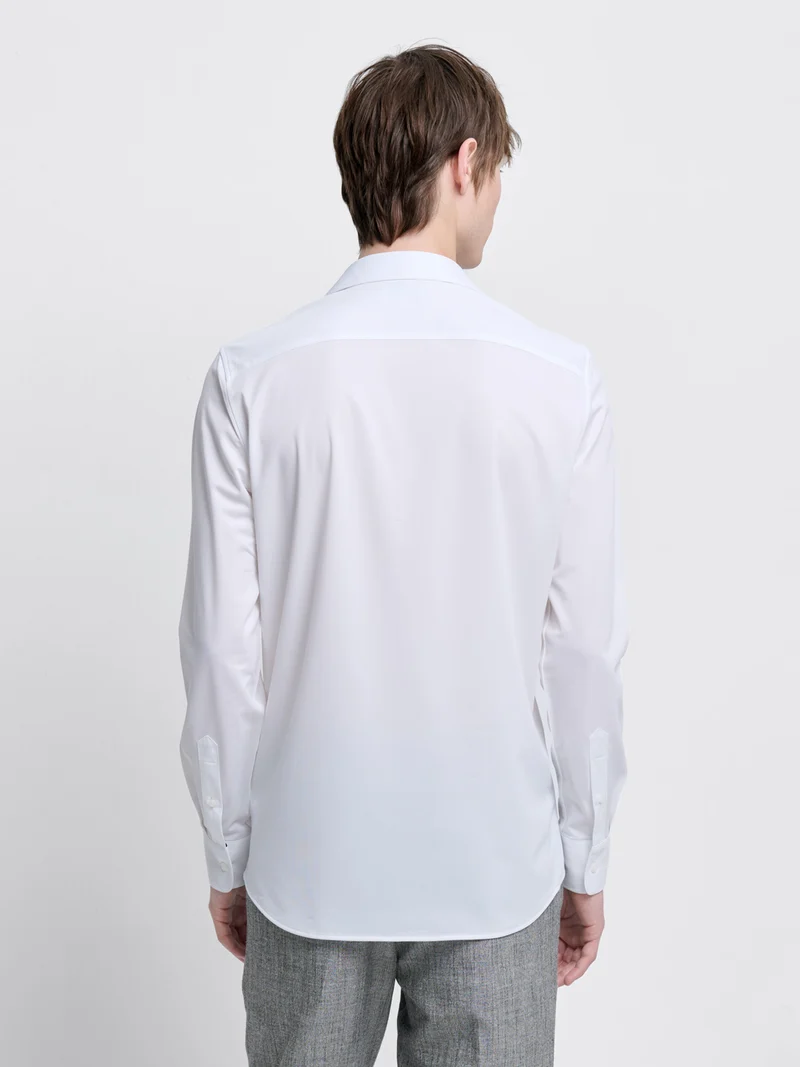 Chemise extraslim tissu traveler
