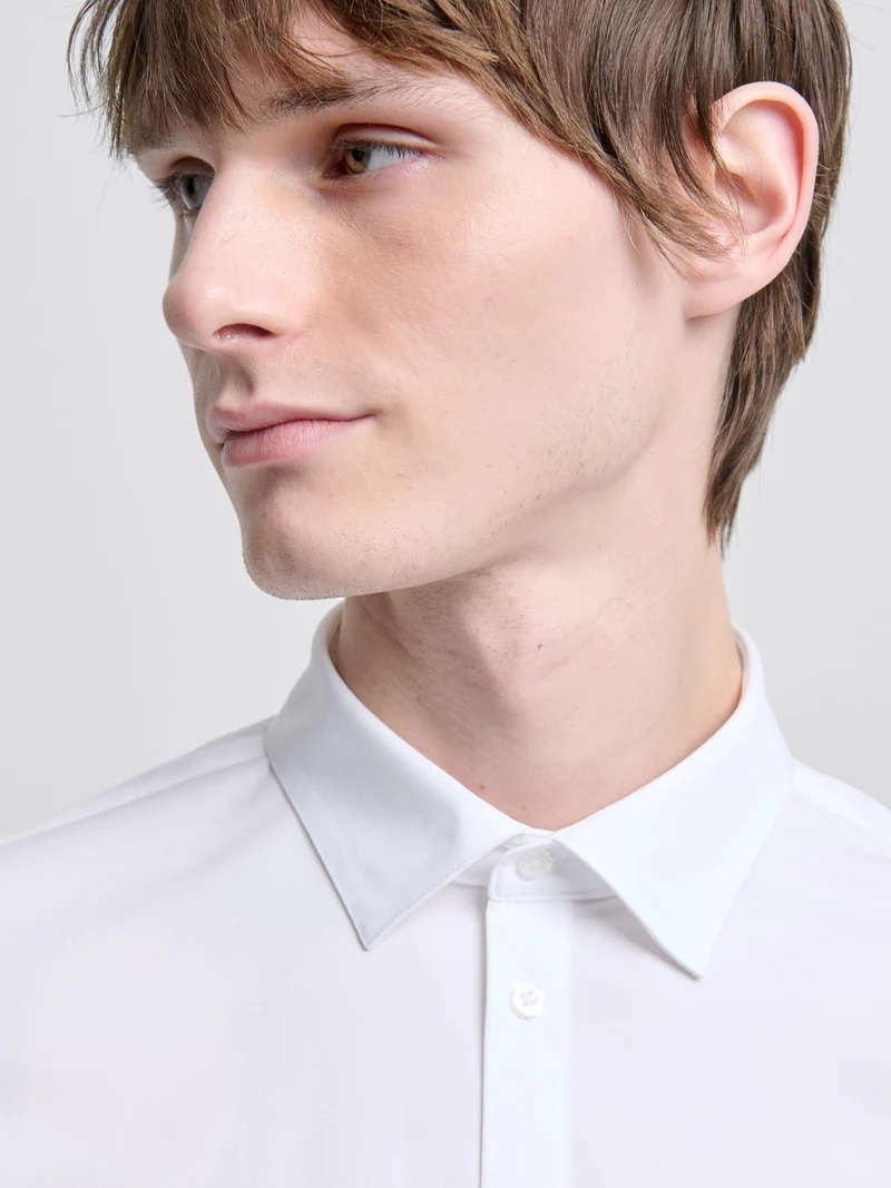 Chemise extraslim tissu traveler