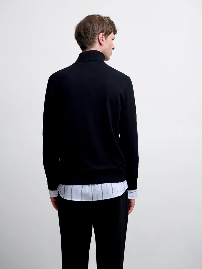 Pull col roulé en jersey