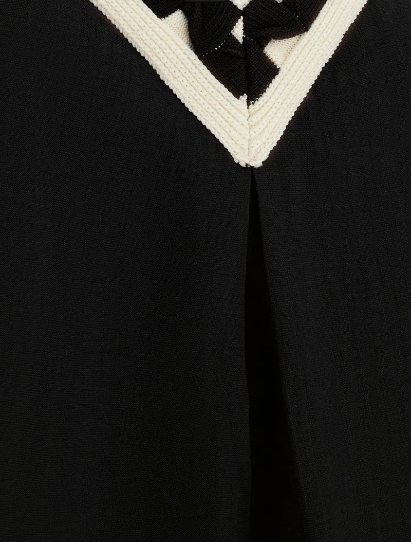 Top uni sans manches à col V stylisé - Noir
