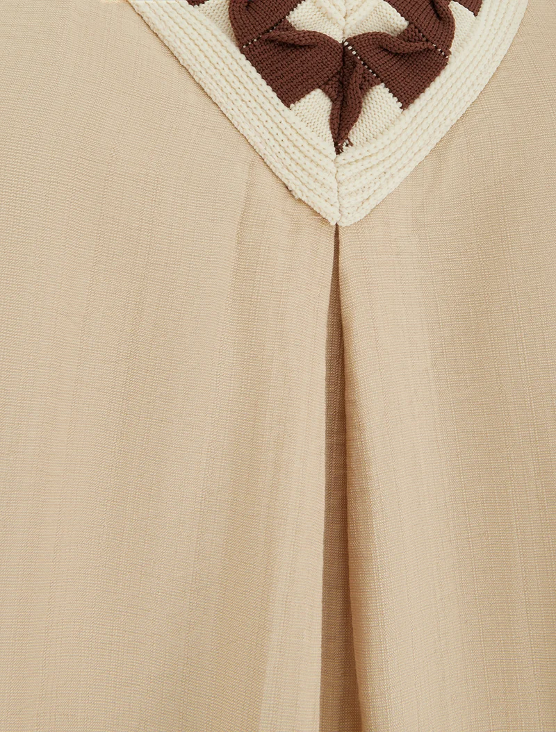 Top uni sans manches à col V stylisé - Beige