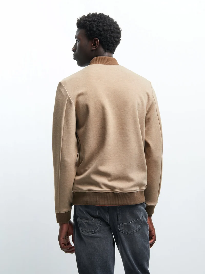 Sweat col teddy bicolore