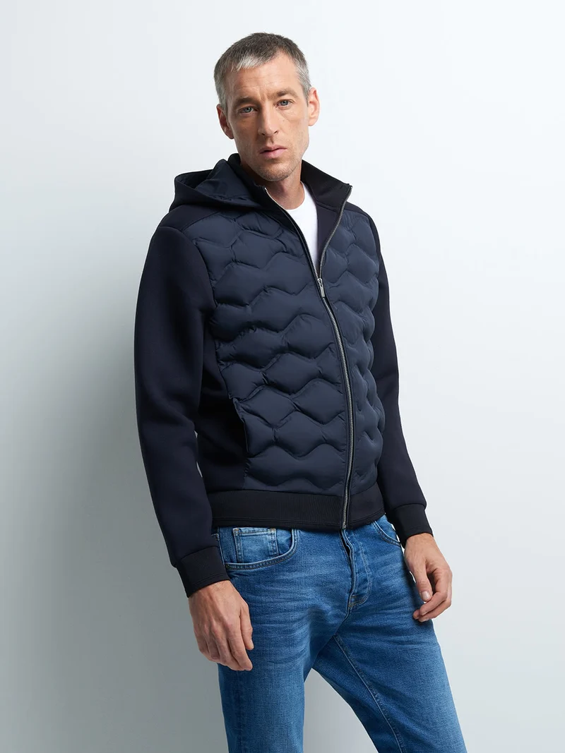 Veste legère à capuche matelassé