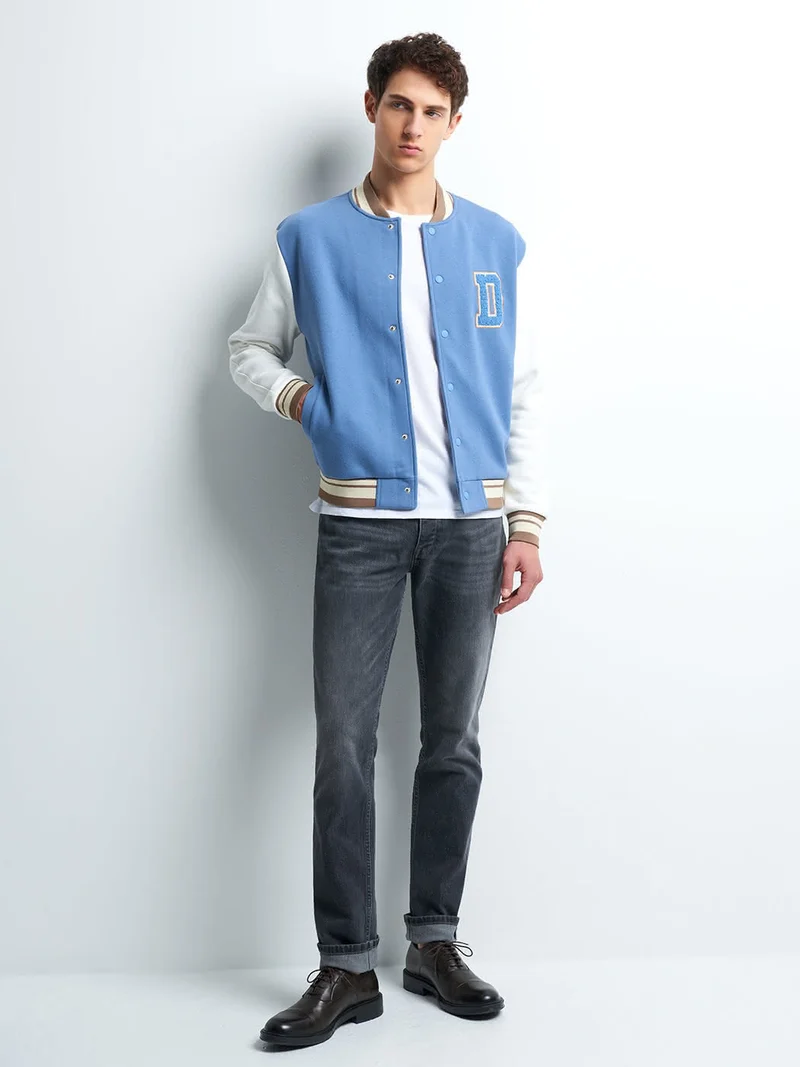 Blouson col teddy bicolore