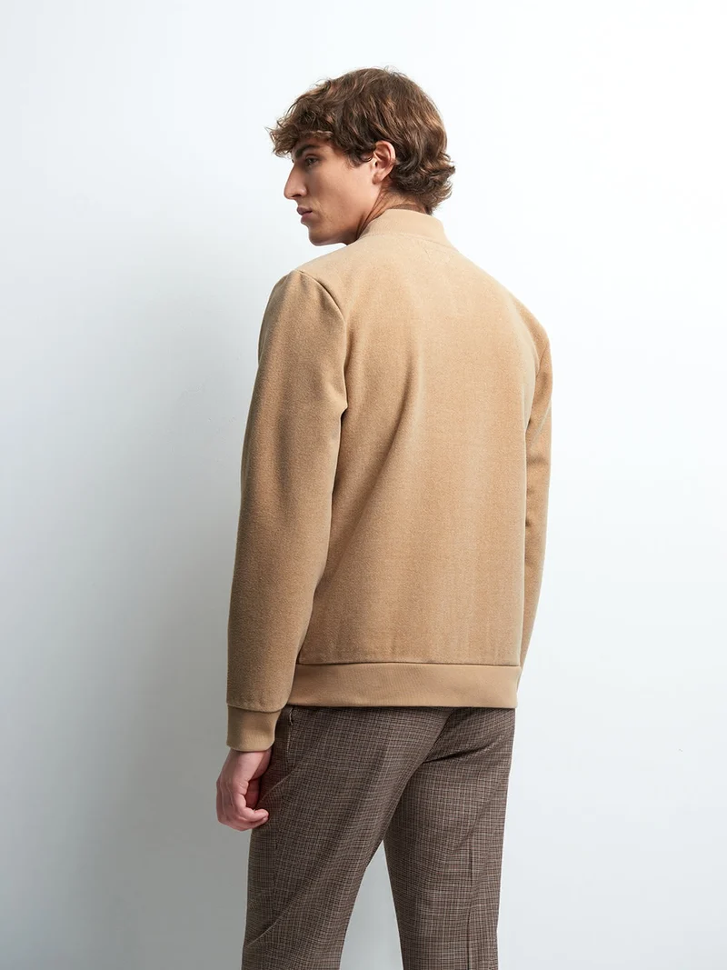 Blouson col montant bi-matière