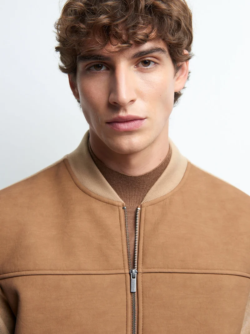 Blouson col montant bi-matière