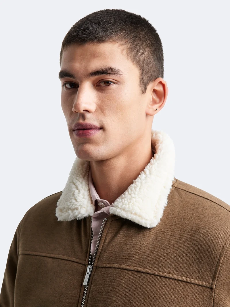 Blouson col sherpa jersey