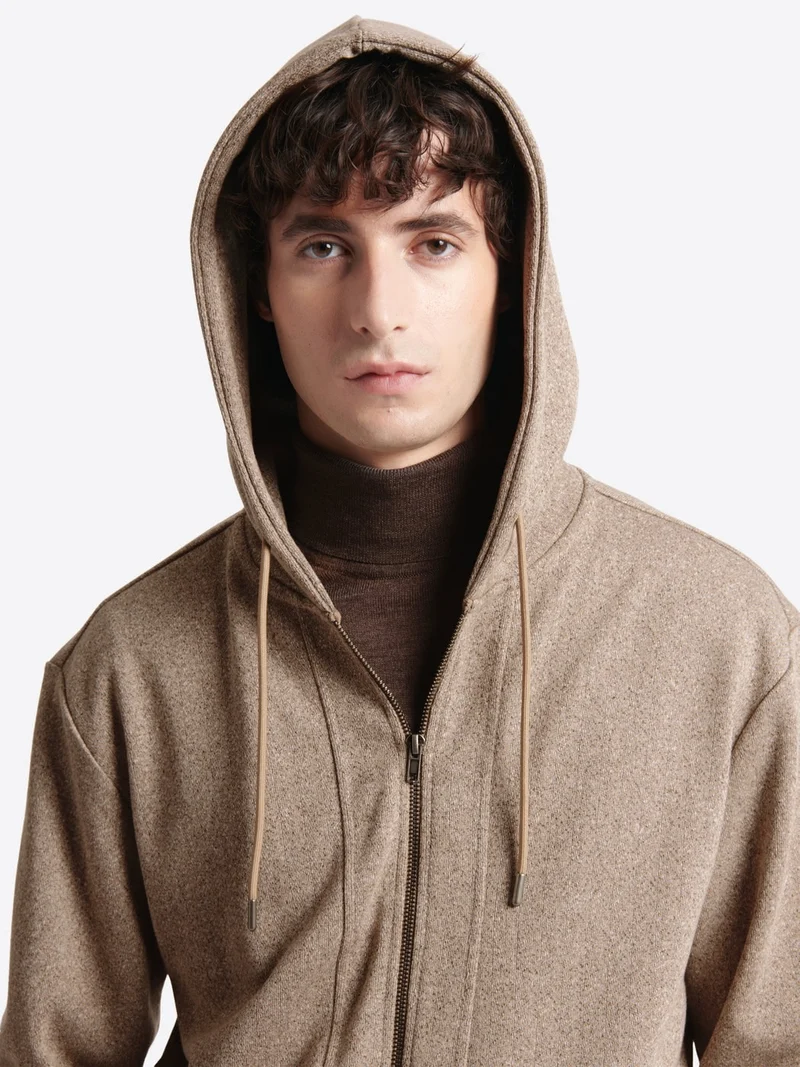 Sweat zippé chiné à capuche