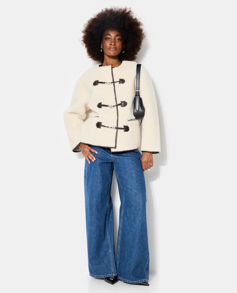 Blouson droit en sherpa avec attaches mousqueton